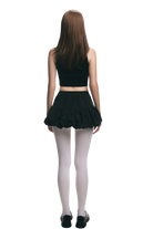 GRIEF TOP.
