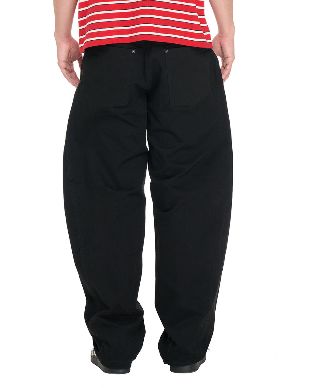 PP Buck Pants, Black – close-up on model, lower body