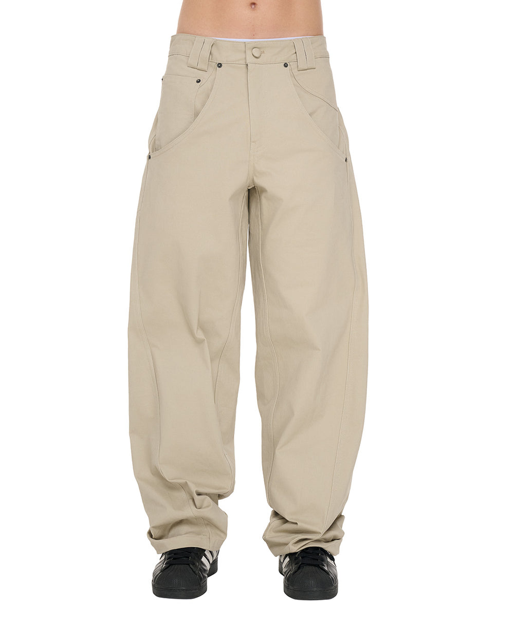 PP Buck Pants, Beige – front view on model, lower body