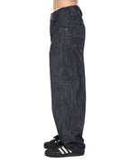 PP Gritty Selvedge Denim, Black – side view on model, lower body