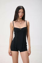 NAOMI PLAYSUIT.